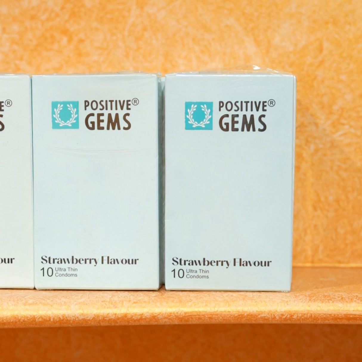 PositiveGems Strawberry Clear Condoms